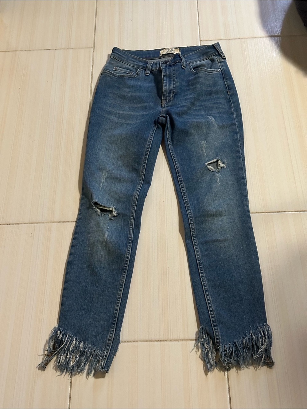 We The Free Distressed Blue Cropped Jeans with Fringed Hem